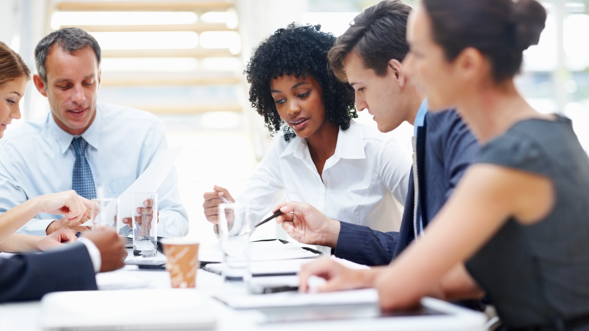 A team discuss their decisions