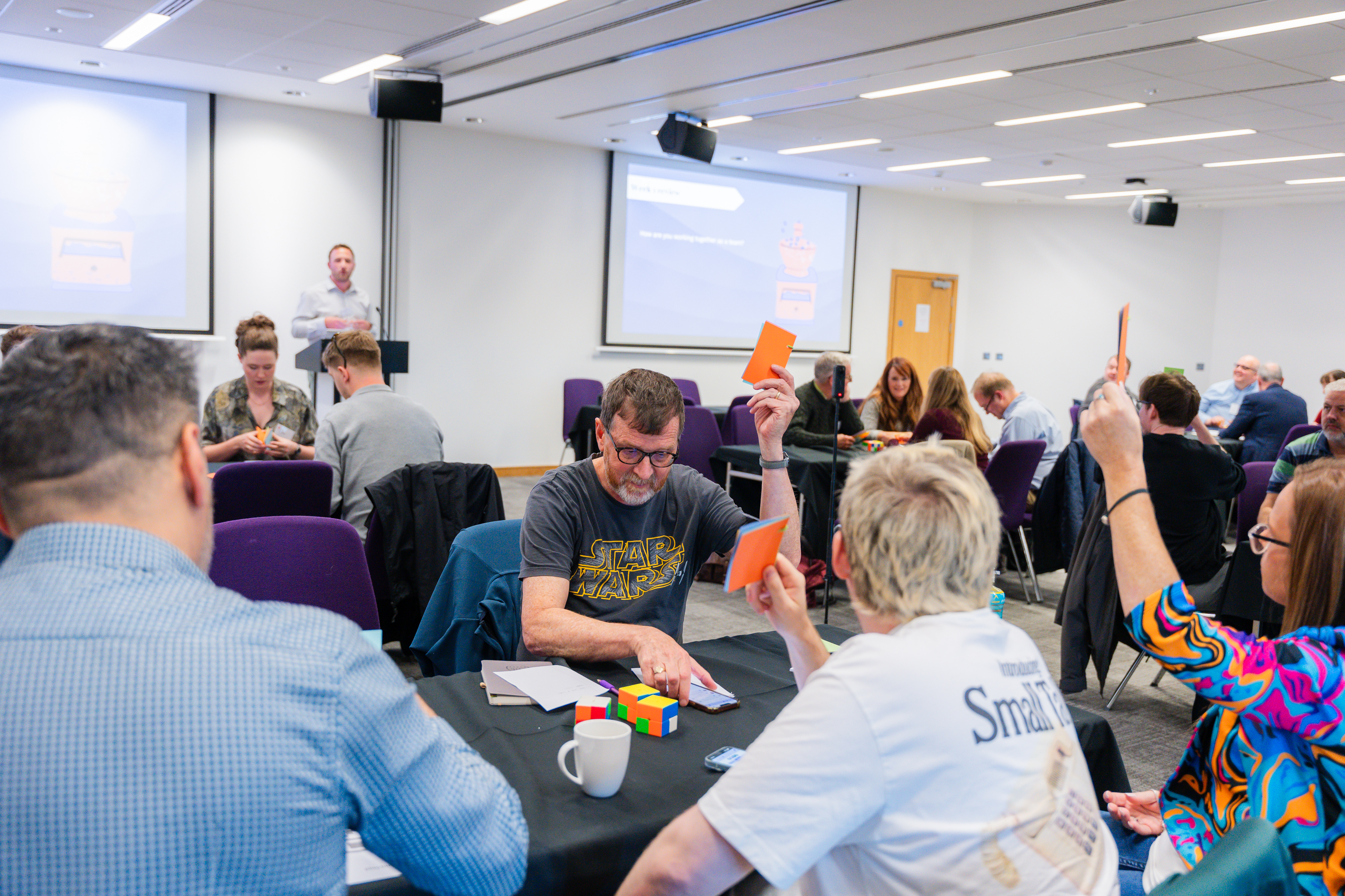 Participants voting during a simulation