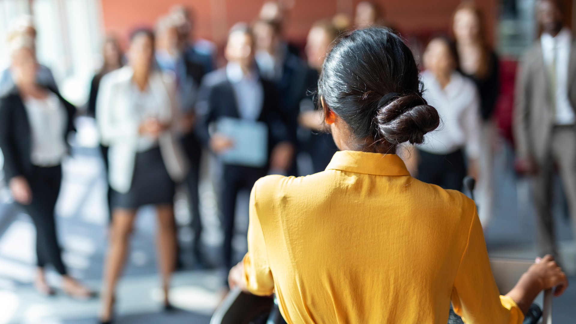 A woman presenting to a group