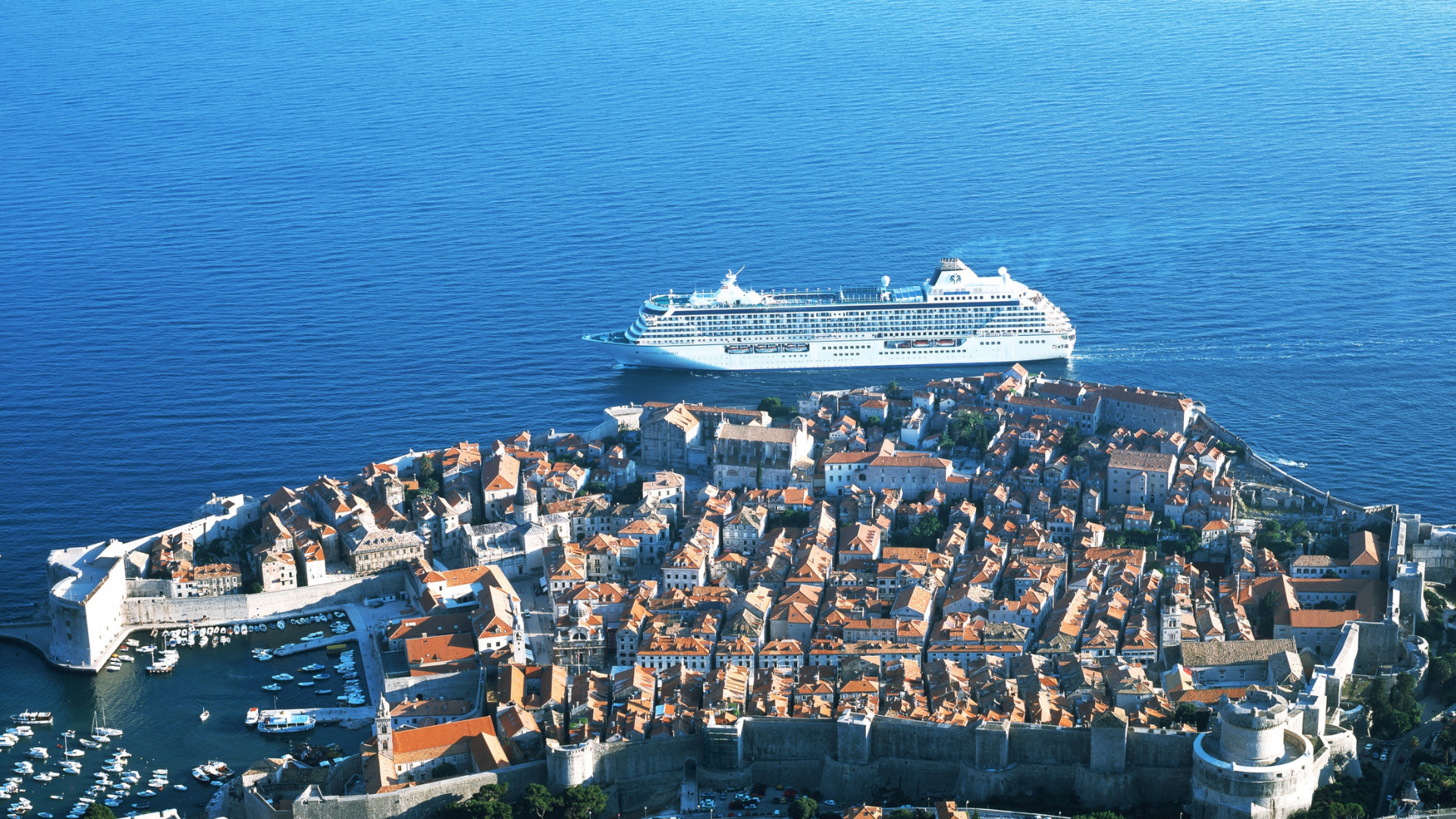 A cruise ship arriving at a town